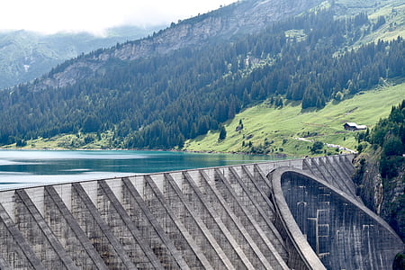 wide angle photo of gray concrete dam thumbnail