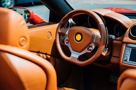 Leather interior of a car with controls on the steering thumbnail