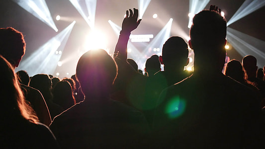 silhouette of people front of light thumbnail