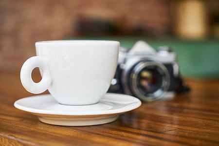 shallow focus photography of white cup and saucer thumbnail