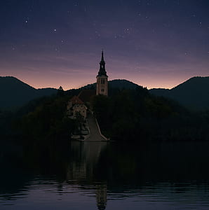 photography of castle near in lake thumbnail