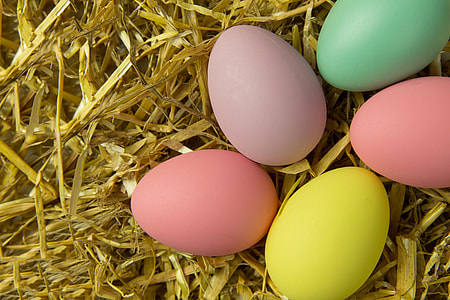 Overhead shot of colourful Easter eggs thumbnail
