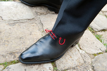 Person Wearing Black Leather Dress Shoes thumbnail