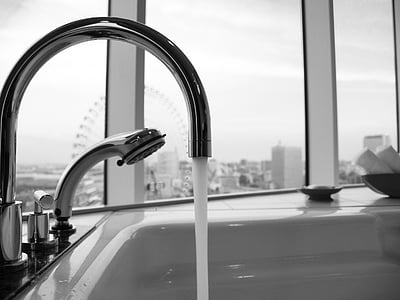 water pouring from sink faucet thumbnail