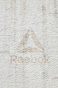Reebok logo painted on wall thumbnail