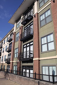 brown and white building at daytime thumbnail