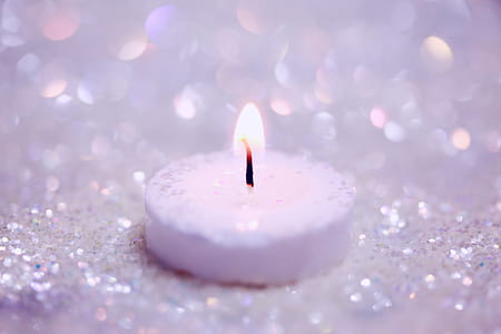 white candle stick in shallow focus photography thumbnail