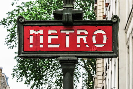 Sign shows where you can find a Paris, France metro station. Newer stencil type. thumbnail
