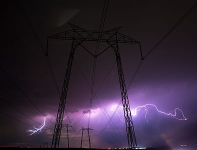 two black towers near lightnings thumbnail