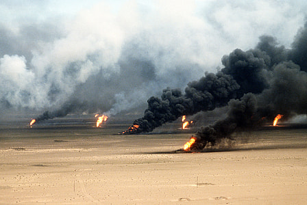Oil well fires rage outside Kuwait City in 1991 in the Gulf War thumbnail