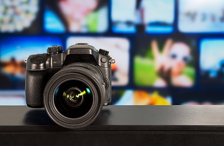 black DSLR camera thumbnail