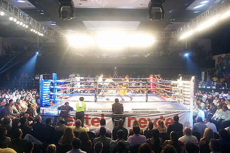 two boxers on ring surrounded with people thumbnail