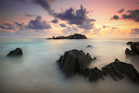 rock covered in fog thumbnail