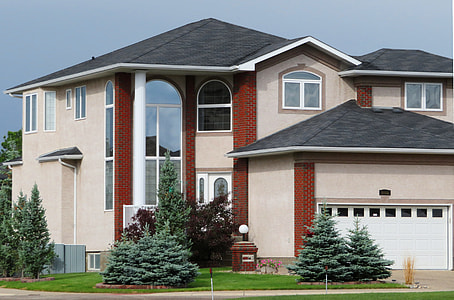 brown and beige concreted house thumbnail