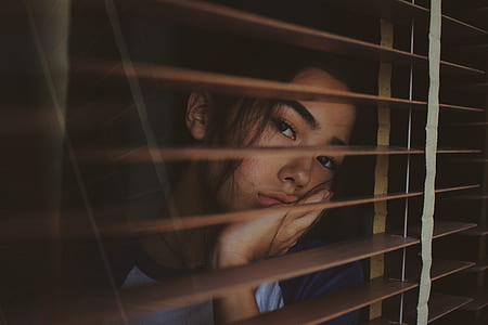 woman peeping at window thumbnail