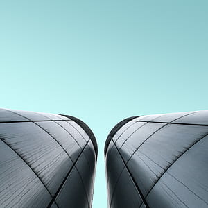 two gray buildings during daytime thumbnail