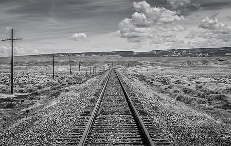 greyscale photo train rails thumbnail