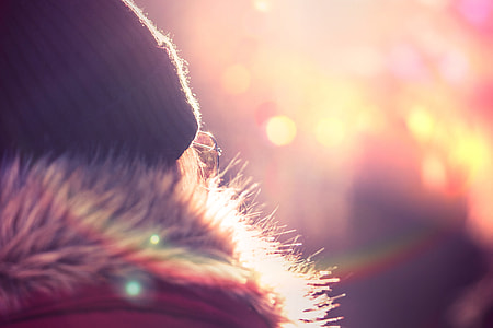 Young Woman in Winter Jacket and Hat thumbnail