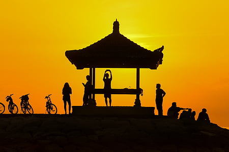 silhouette photo of people on gazebo thumbnail