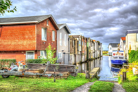 architectural photography of multicolored houses thumbnail