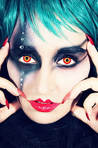 photo of person with black eyeshadow and red lipstick thumbnail