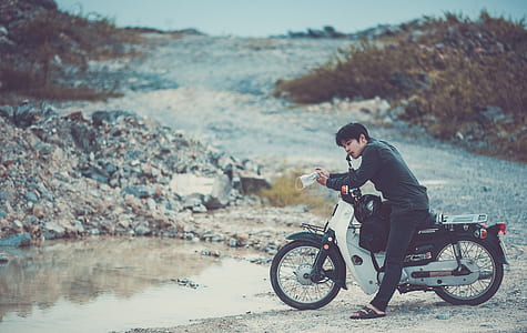 Man Riding a Motorcycle thumbnail