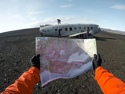 person holding map paper thumbnail