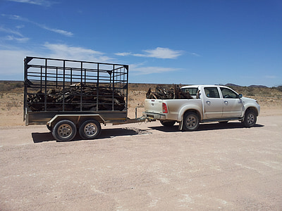 white crew-cab pick up truck with trailer during daytime thumbnail