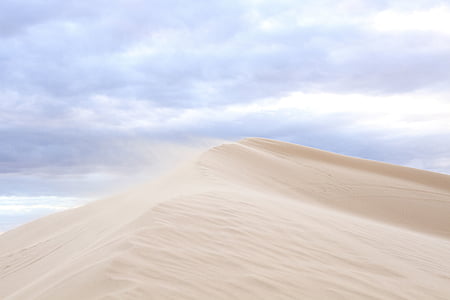 wind blowing sand at desert thumbnail