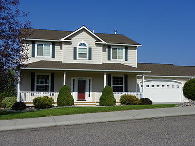 white and gray house near tree under blue sky during daytime photography thumbnail