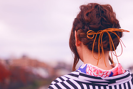 focus photography of woman with braided hair thumbnail
