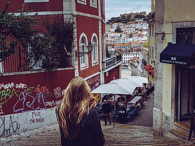 Woman in Black Cardigan Standing Near Concrete Stais thumbnail