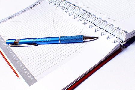 blue click pen on notebook thumbnail
