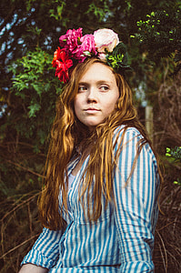 woman standing near green trees thumbnail