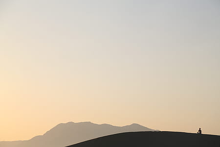 man on top of mountain thumbnail