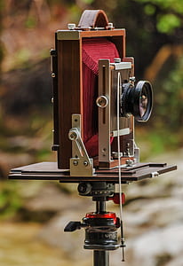selective focus photography of folding camera thumbnail