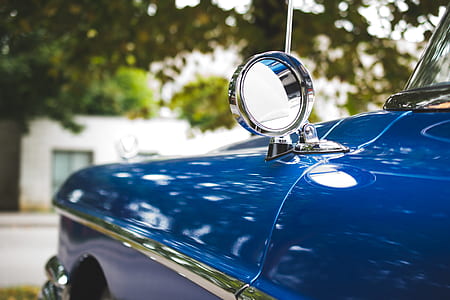 closeup photo of classic blue car thumbnail