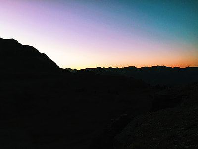 silhouette of mountain during sunset thumbnail