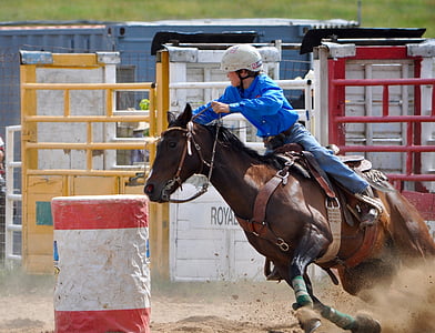 boy riding horse on track thumbnail