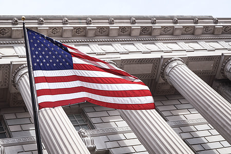 low-angle photography of flag of America thumbnail