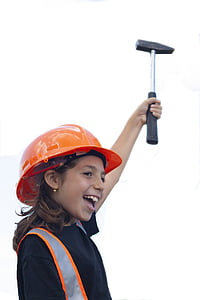 girl holding hammer on outdoors thumbnail