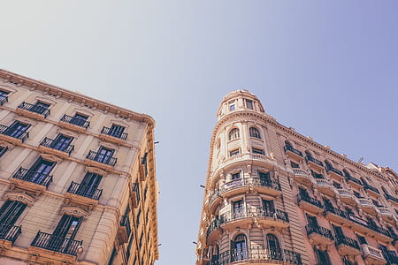 worms eye view of brown concrete building thumbnail
