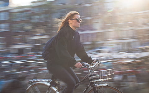 Woman Riding Bicycle thumbnail