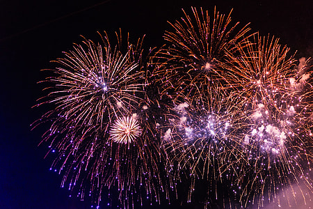 Colorful Fireworks Pyrotechnics Against Black Night Sky thumbnail