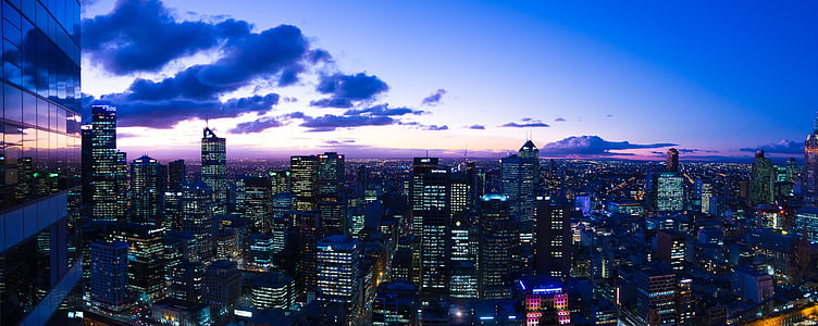 aerial photography of high rise buildings during golden hour thumbnail