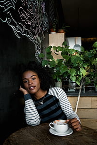 woman leaning on wall thumbnail