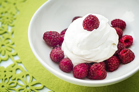 bunch of strawberries with cream on bowl thumbnail