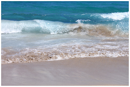 ocean waves crushing on brown sand at daytime thumbnail