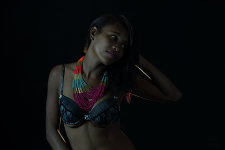 woman wearing bra in dark area thumbnail