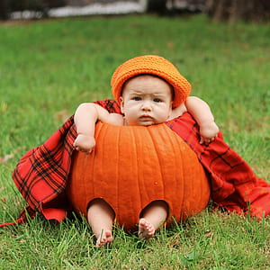 baby wearing squash costume thumbnail